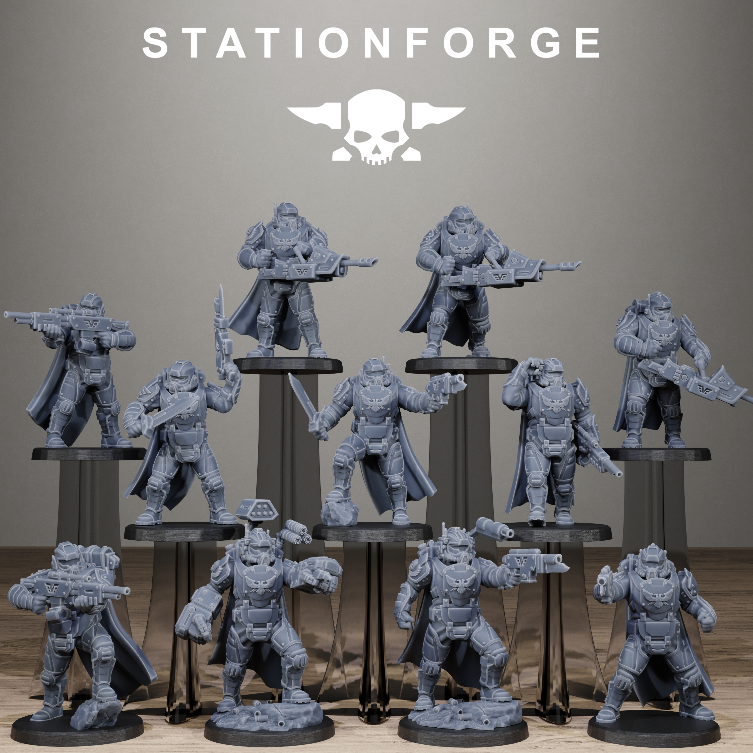 Collection of gray miniature figures on stands with 'Stationforge' logo above.