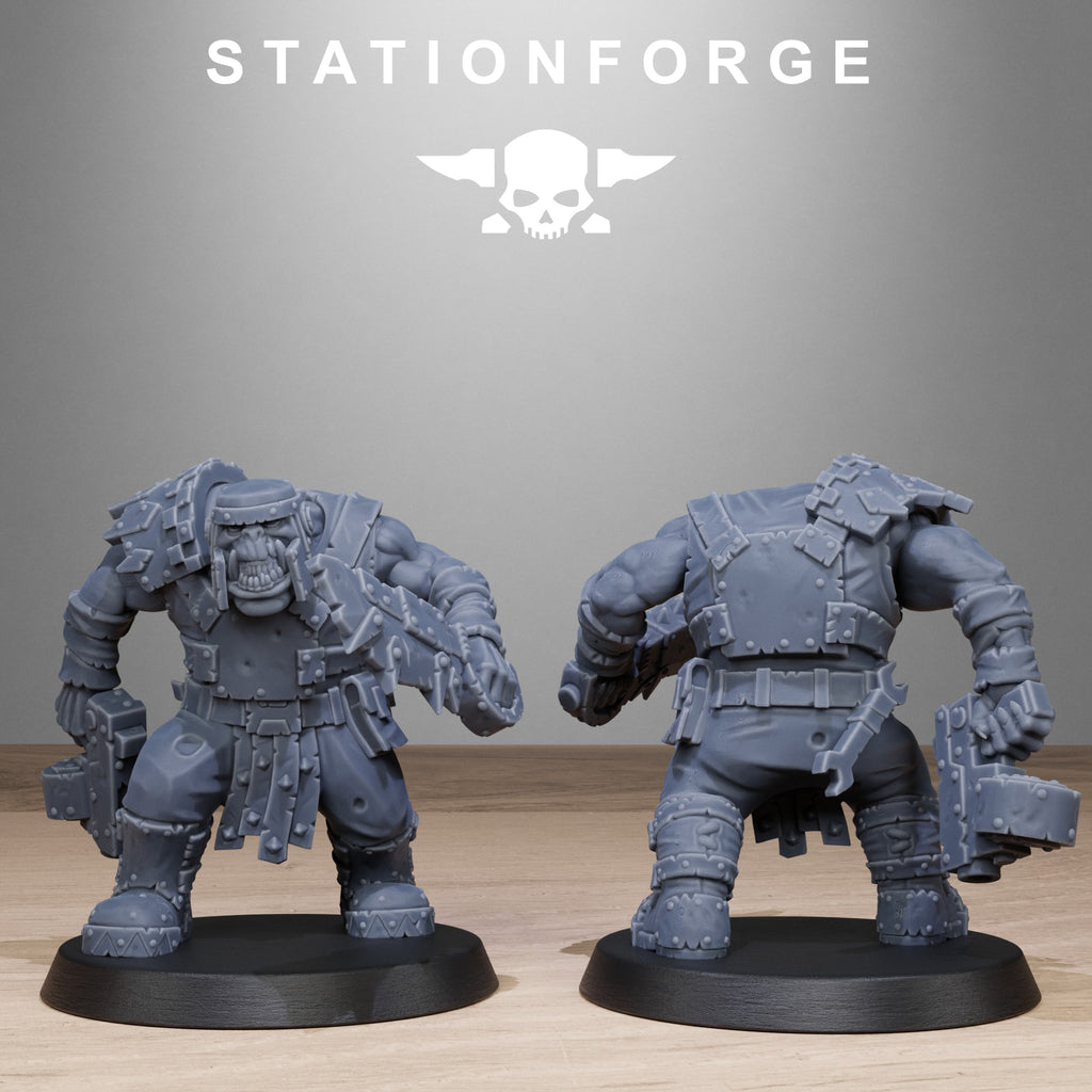 Two gray miniature figures on black bases with 'Stationforge' logo above.