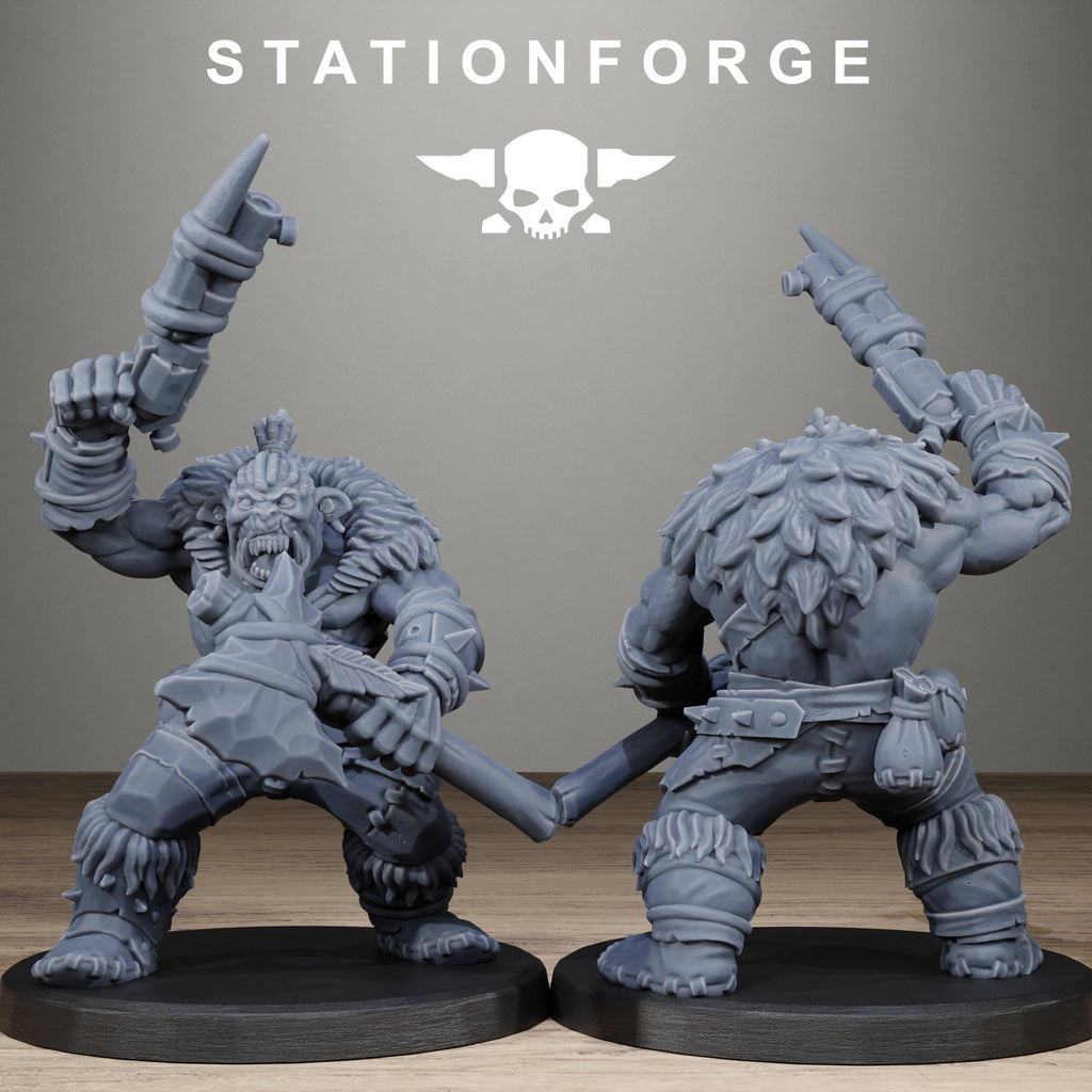 Two gray fantasy warrior figurines on black bases with 'Stationforge' logo above.