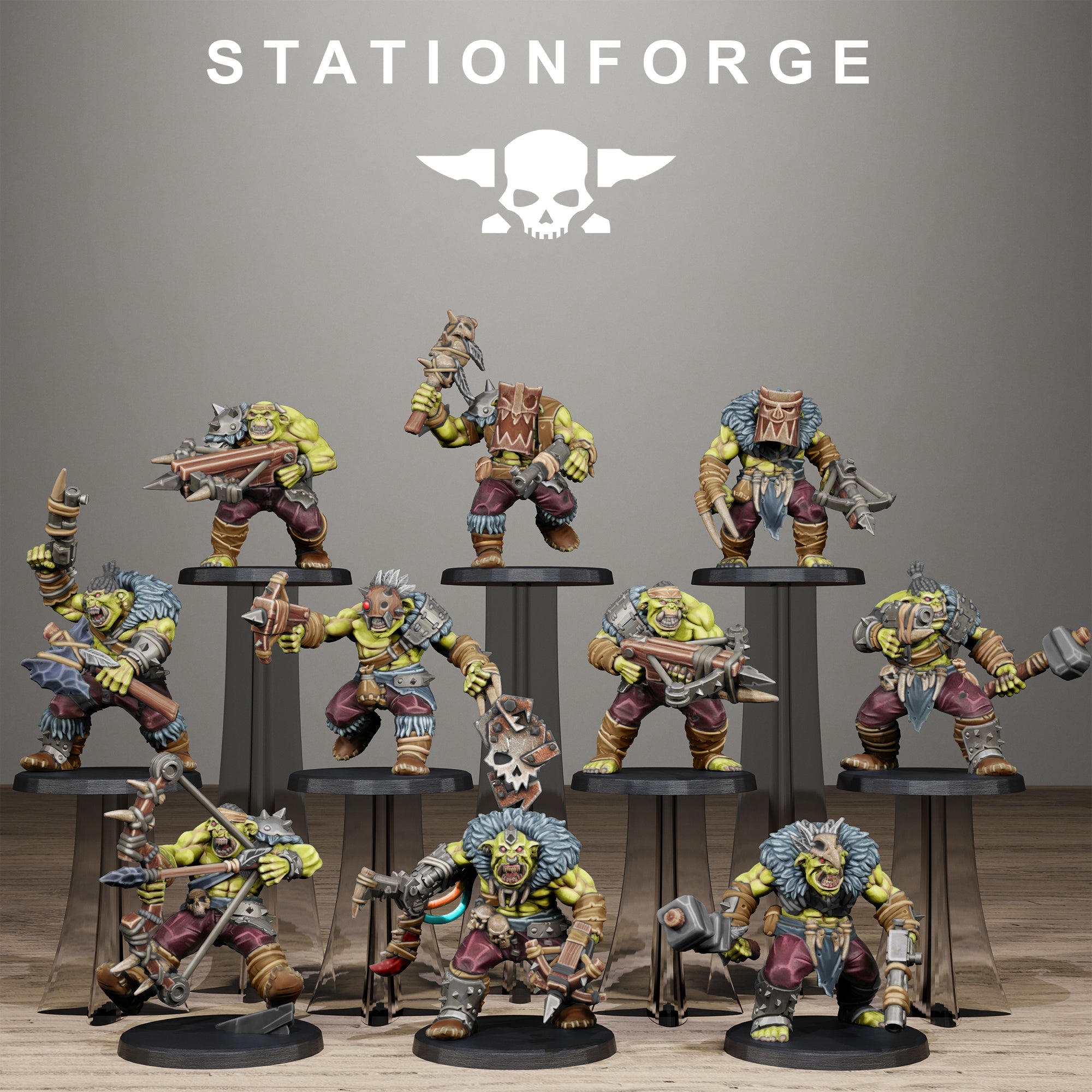 Collection of miniatures on stands with 'Stationforge' branding above.