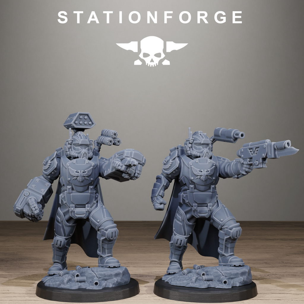 Two gray warrior figurines on a wooden surface with 'Stationforge' logo above.