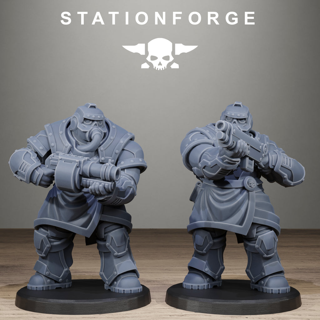 Two gray warrior figurines on black bases with 'Stationforge' logo above.