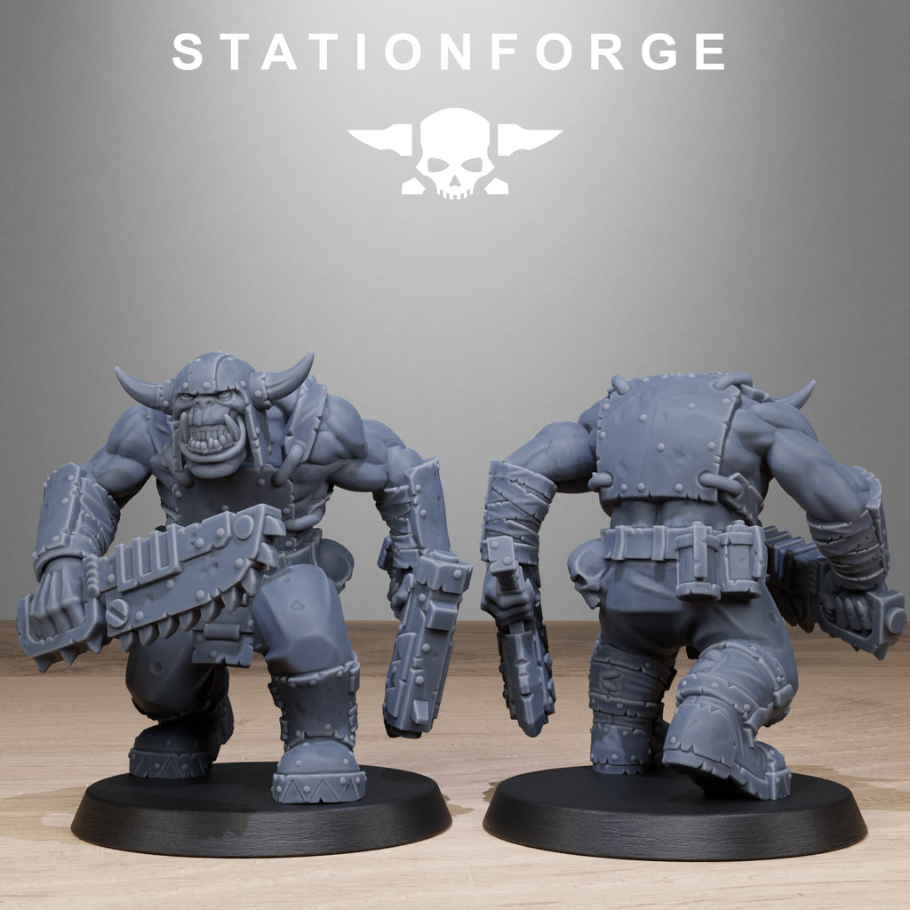 Two gray warrior figurines on black bases with 'Stationforge' branding above.